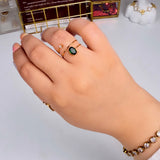 Emerald Whirl Ring