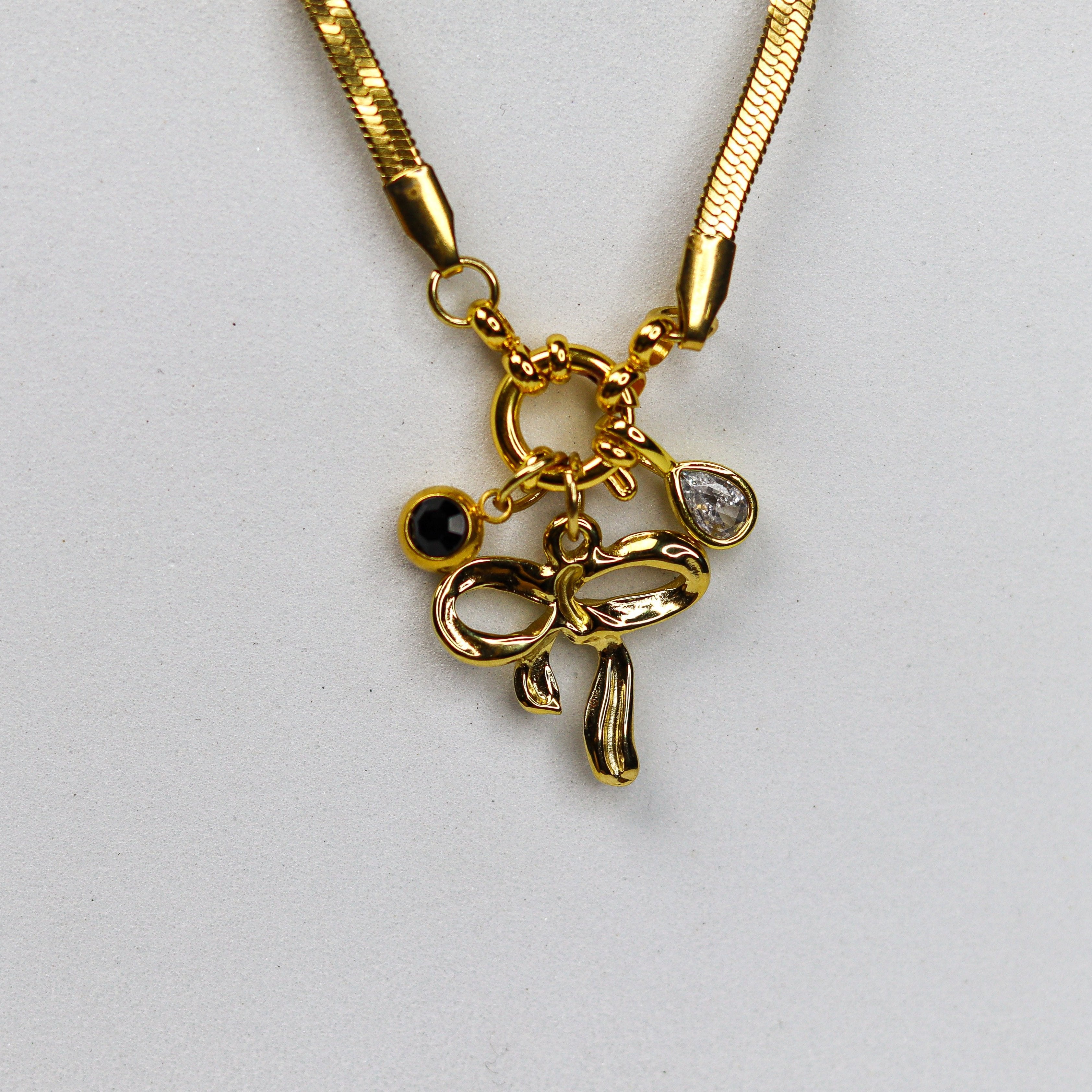 Opulent Bow Charm Necklace - Adorn-iq