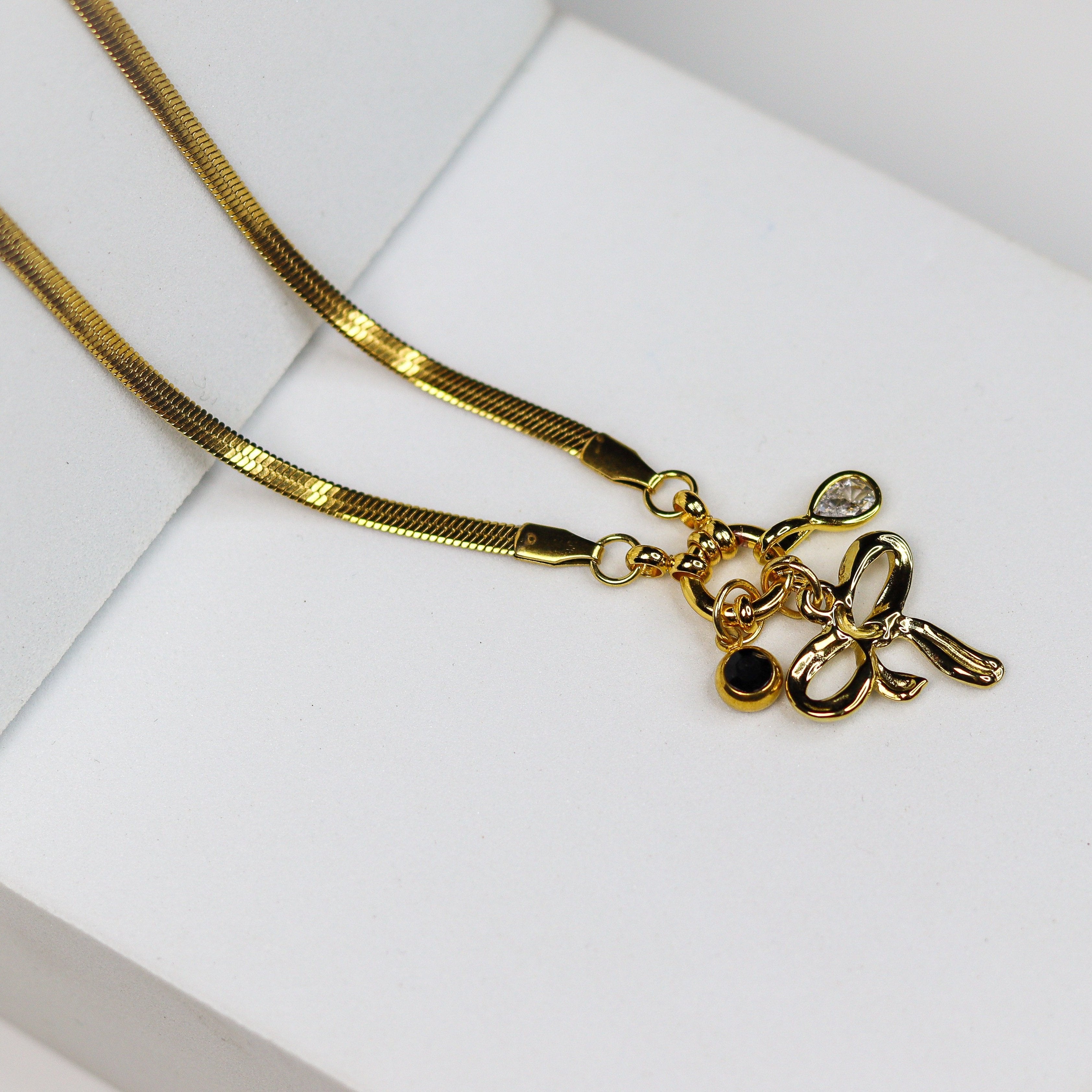 Opulent Bow Charm Necklace - Adorn-iq