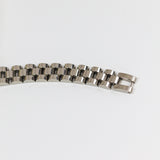 Metallic bracelet on a white background