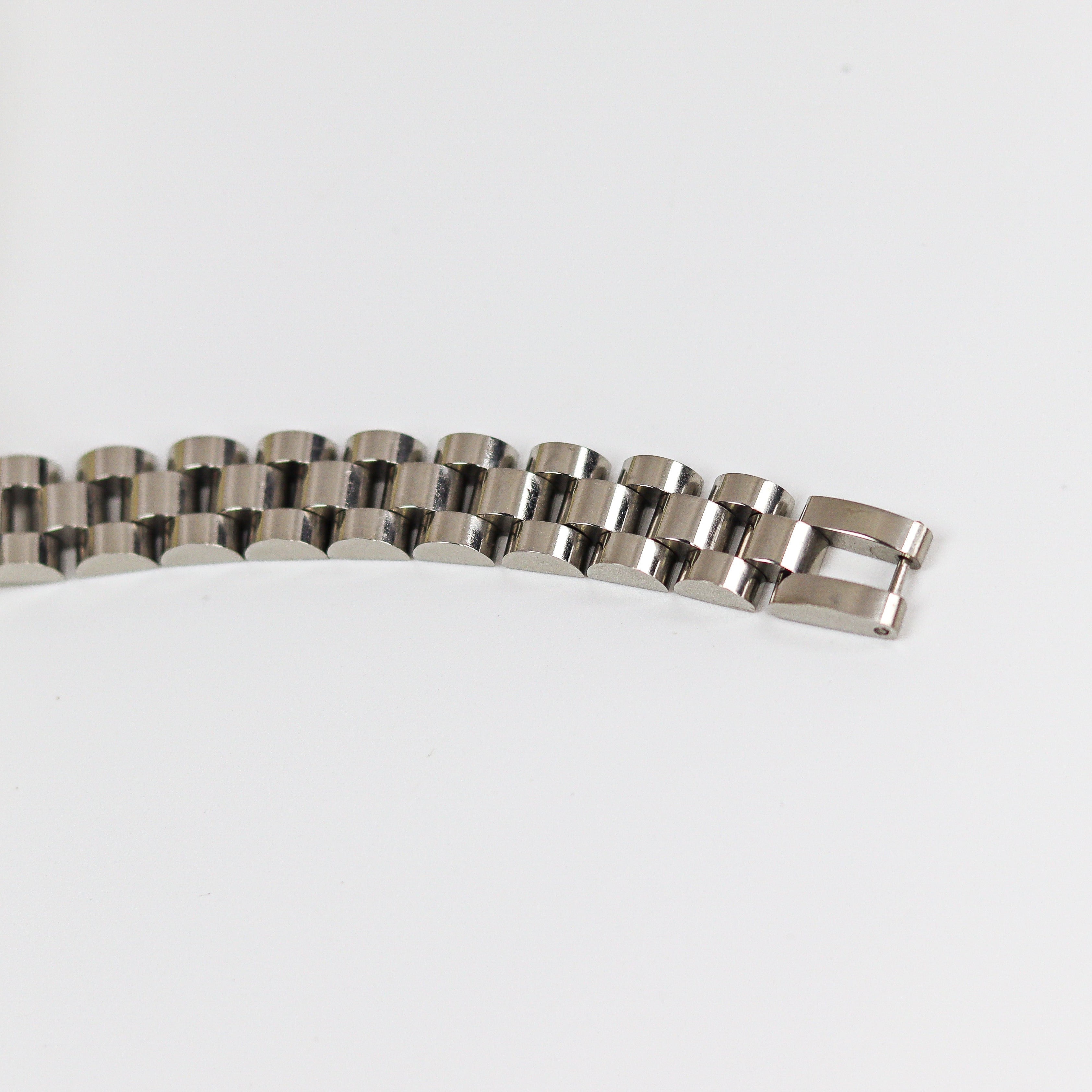 Metallic bracelet on a white background